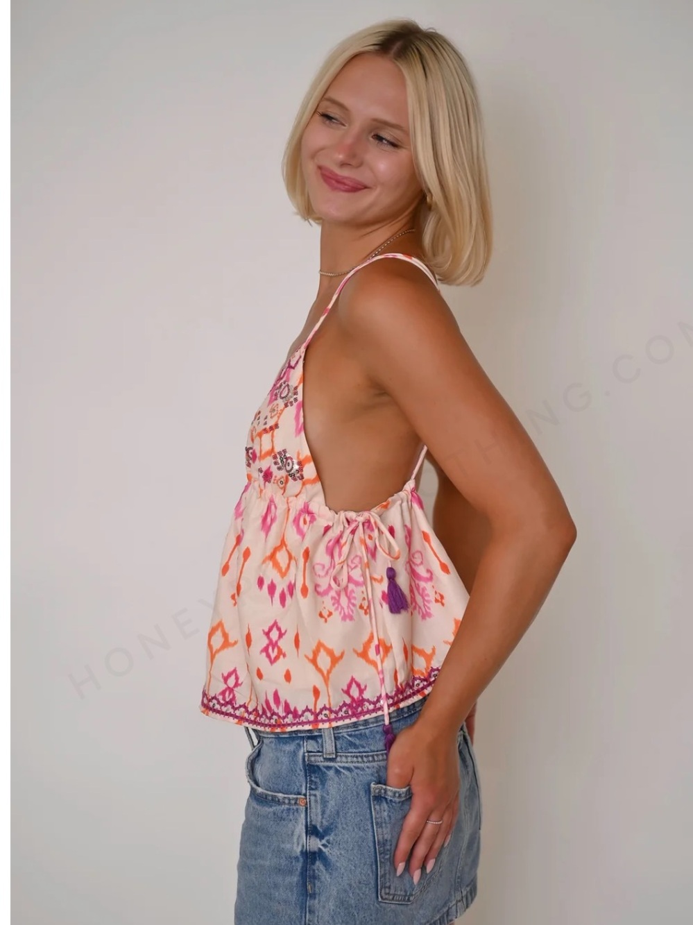 Embroidered V-Neck Sleeveless Top in White with Pink & Orange Print